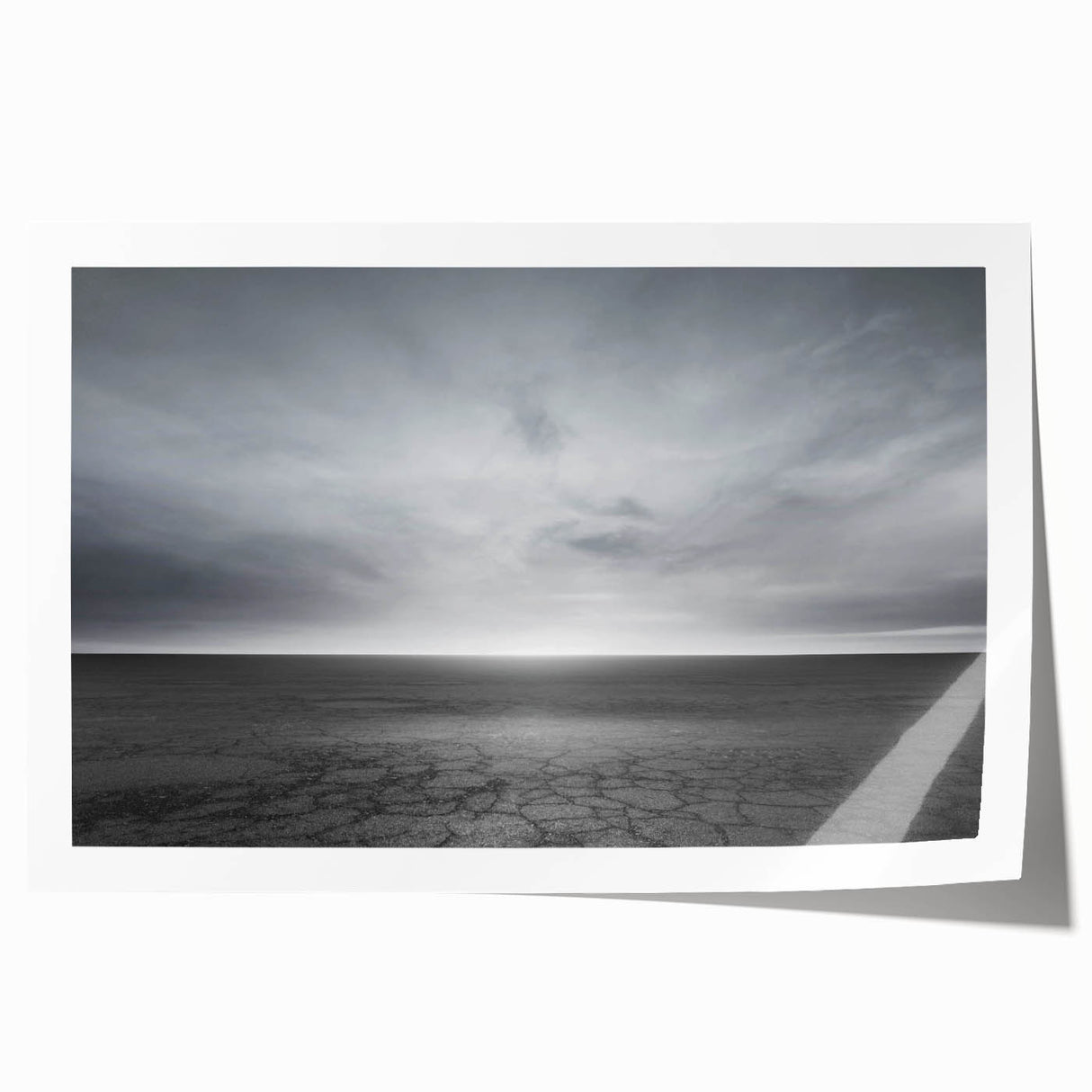 Vibrant rolled print showcasing a stunning landscape with dramatic skies, featuring rich colors and intricate details, perfect for home decor.