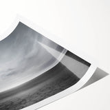 Stunning rolled print of a vibrant landscape featuring a sunset sky with dramatic clouds, ideal for home decor or art collection, securely packaged in a protective tube.