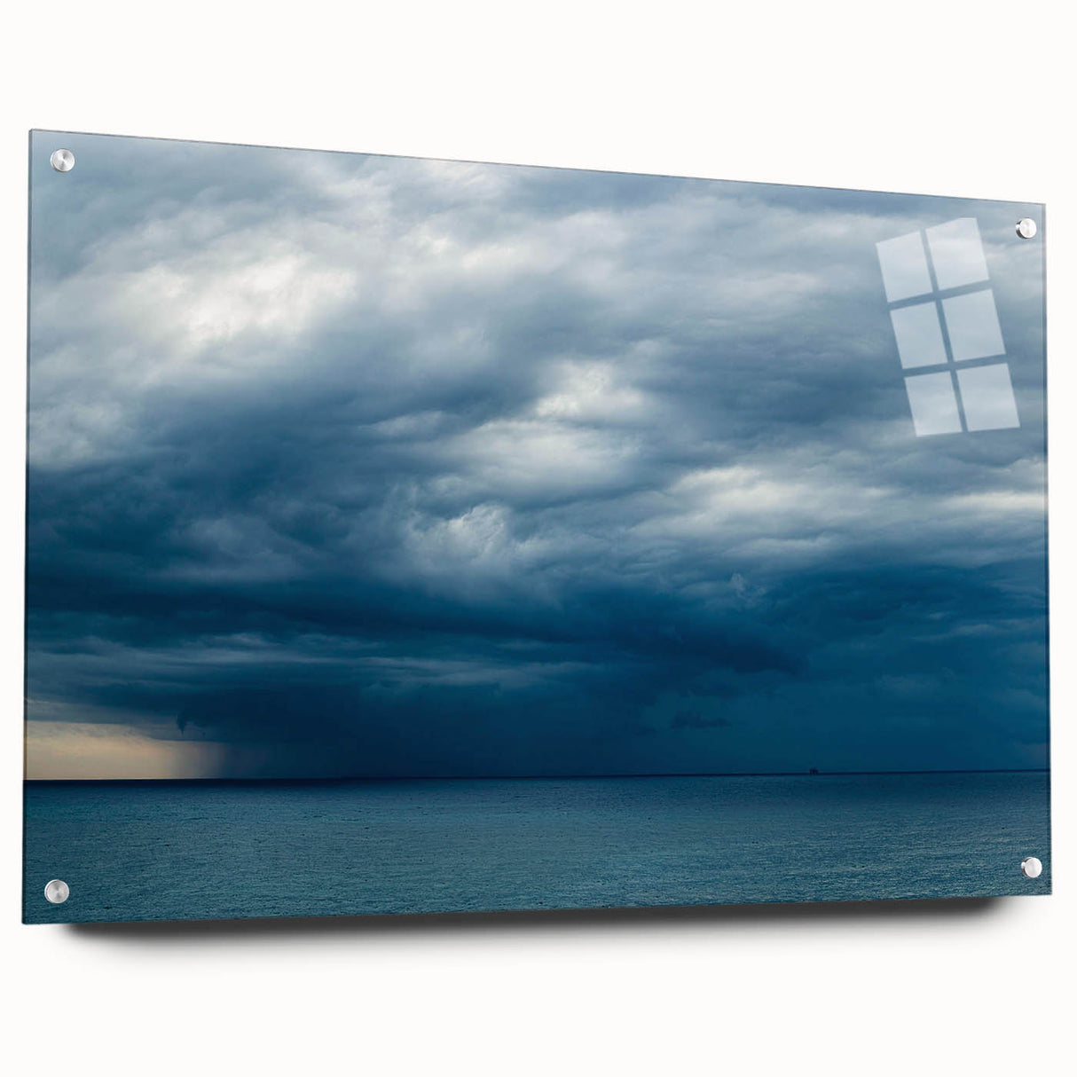 Acrylic glass wall art collection showcasing vibrant landscapes and skyscapes, displayed from a side view with visible pins holding it in place, perfect for modern decor.