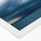 Rolled canvas wall art collection showcasing vibrant landscapes and skyscapes in rich colors, ideal for home decor, presented in a protective cardboard tube.