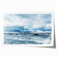 Rolled print showcasing a serene landscape with vibrant hues of blue and orange, ideal for home decor; packaged in a protective cardboard tube for safe shipping.