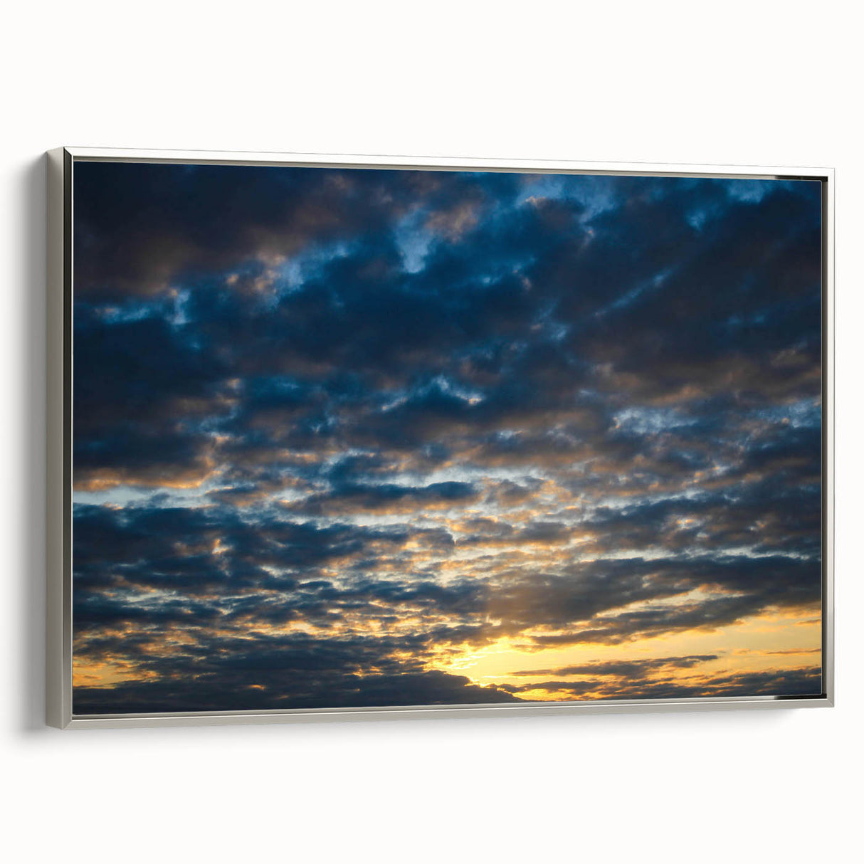 Framed canvas wall art showcasing a stunning landscapes and skyscapes design with a sleek silver frame, ideal for modern home decor. The artwork features vibrant colors and intricate details, making it a focal point in any room. Perfect for enhancing living spaces with a touch of nature-inspired beauty.