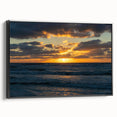 Framed canvas wall art showcasing a vibrant landscapes and skyscapes design, featuring a black frame, displayed from the side to highlight its depth and texture. Ideal for modern home decor.