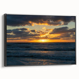 Framed canvas wall art showcasing a vibrant landscapes and skyscapes design, featuring a black frame, displayed from the side to highlight its depth and texture. Ideal for modern home decor.