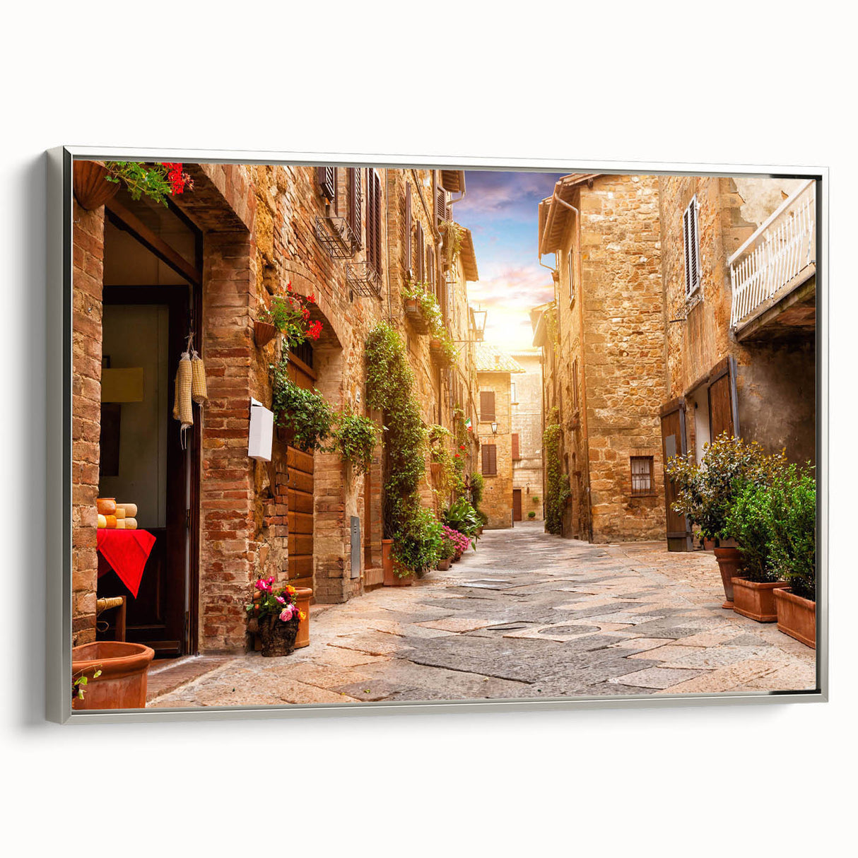 Framed canvas wall art showcasing a modern streetscape design in vibrant colors, accented with a sleek silver frame, ideal for contemporary home decor.