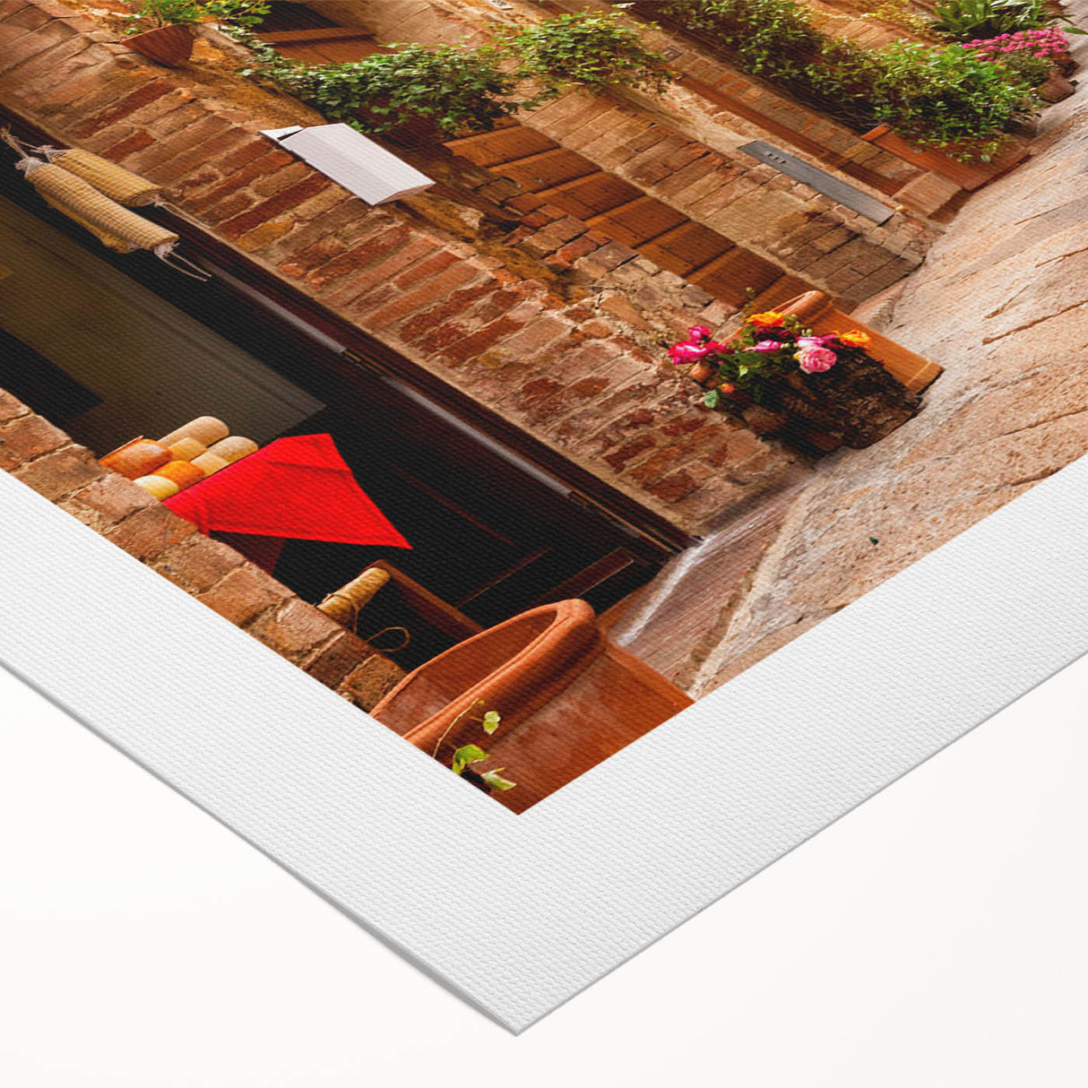 Colorful rolled canvas artwork showcasing a vibrant landscape and street design, ideal for modern home decor, packaged securely in a protective cardboard tube.