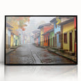 Framed acrylic wall art showcasing a modern street landscape design, featuring vibrant colors and intricate details, presented in a sleek black frame for a contemporary decor accent.