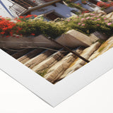 Rolled canvas wall art showcasing a vibrant cityscape design with intricate details, perfect for modern home decor. The artwork is elegantly packaged for safe delivery.