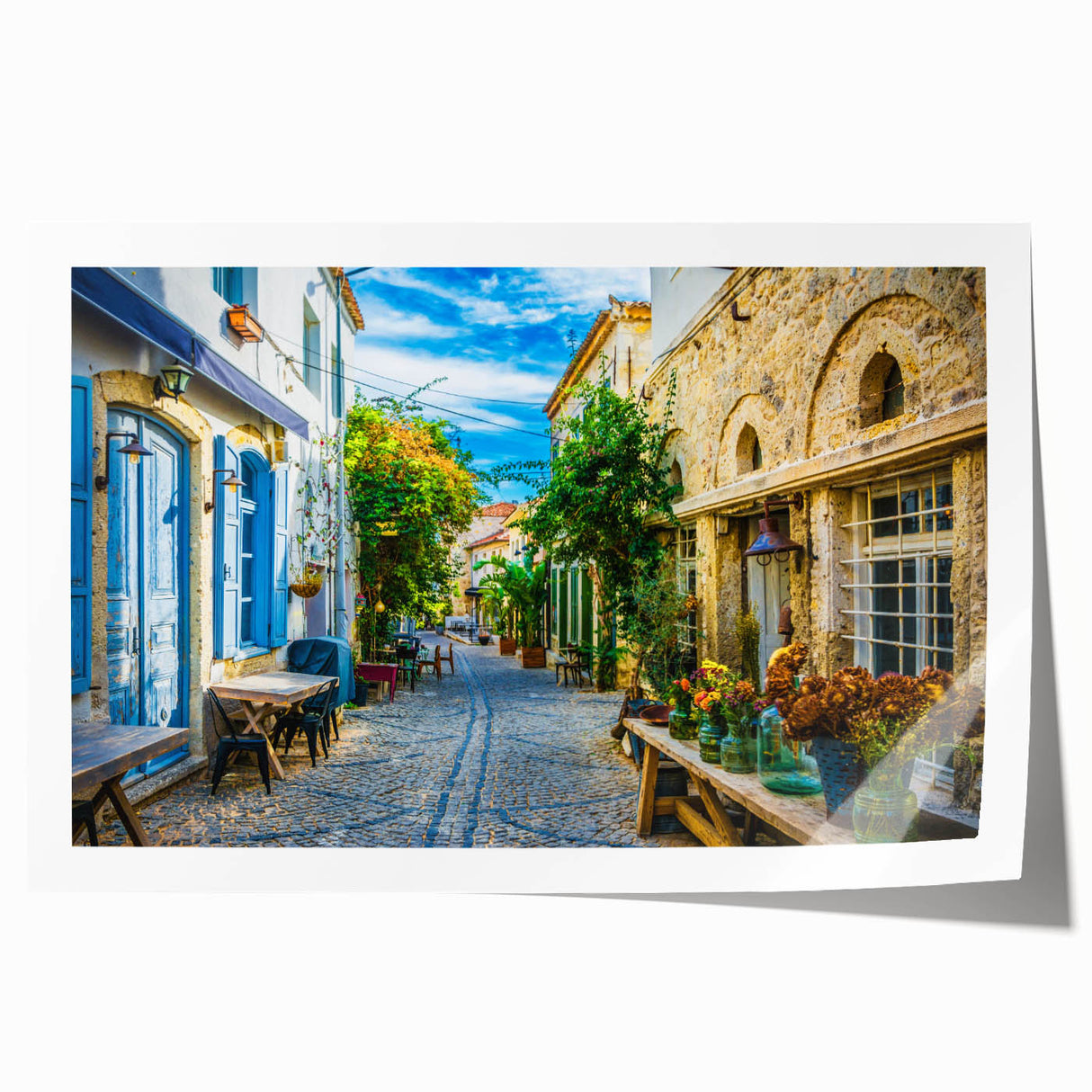 Rolled print showcasing a vibrant city landscape design, featuring colorful street scenes and architectural details, packaged securely in a protective tube.