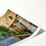 Rolled print showcasing a vibrant street landscape design with rich colors and intricate details, ideal for modern home decor and art enthusiasts.