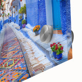 Close-up of a vibrant acrylic glass wall art piece showcasing an abstract cityscape design with bold colors and intricate details, perfect for modern home decor.