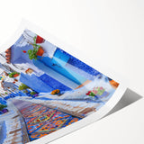 Rolled print showcasing a vibrant landscape featuring abstract street designs with bold colors, packaged securely in a cardboard tube for wall art enthusiasts.
