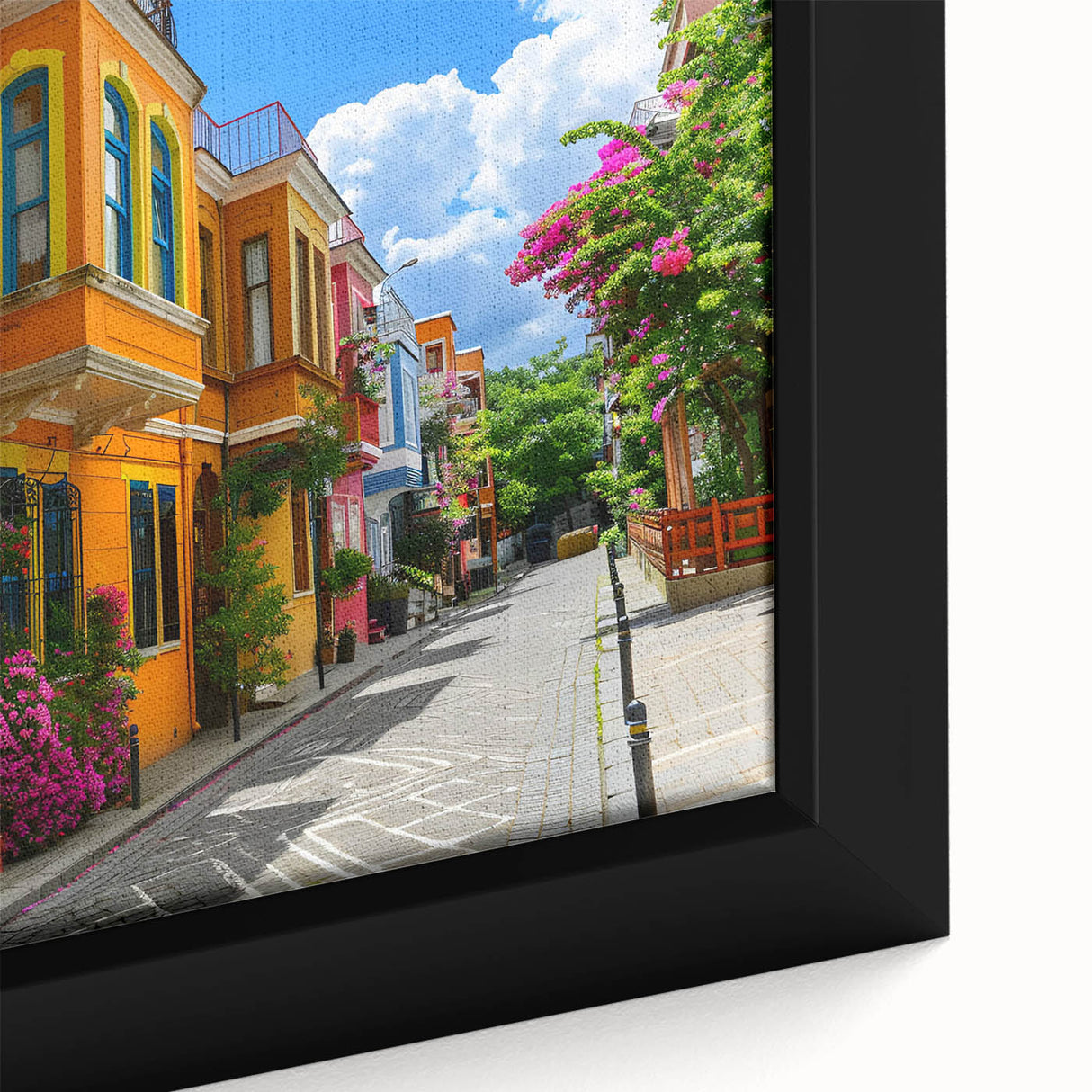 Close-up of a framed canvas wall art piece showcasing a vibrant street landscape design, featuring rich colors and intricate details, perfect for modern home decor.