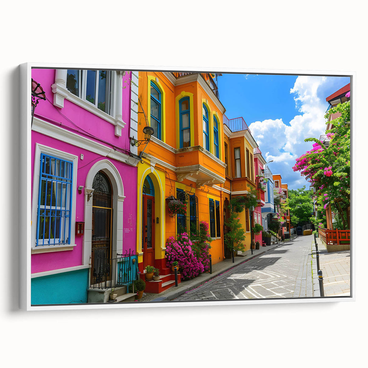 Framed canvas wall art collection showcasing a vibrant street landscape design, featuring a white frame and a side view perspective, perfect for adding a modern touch to home decor.