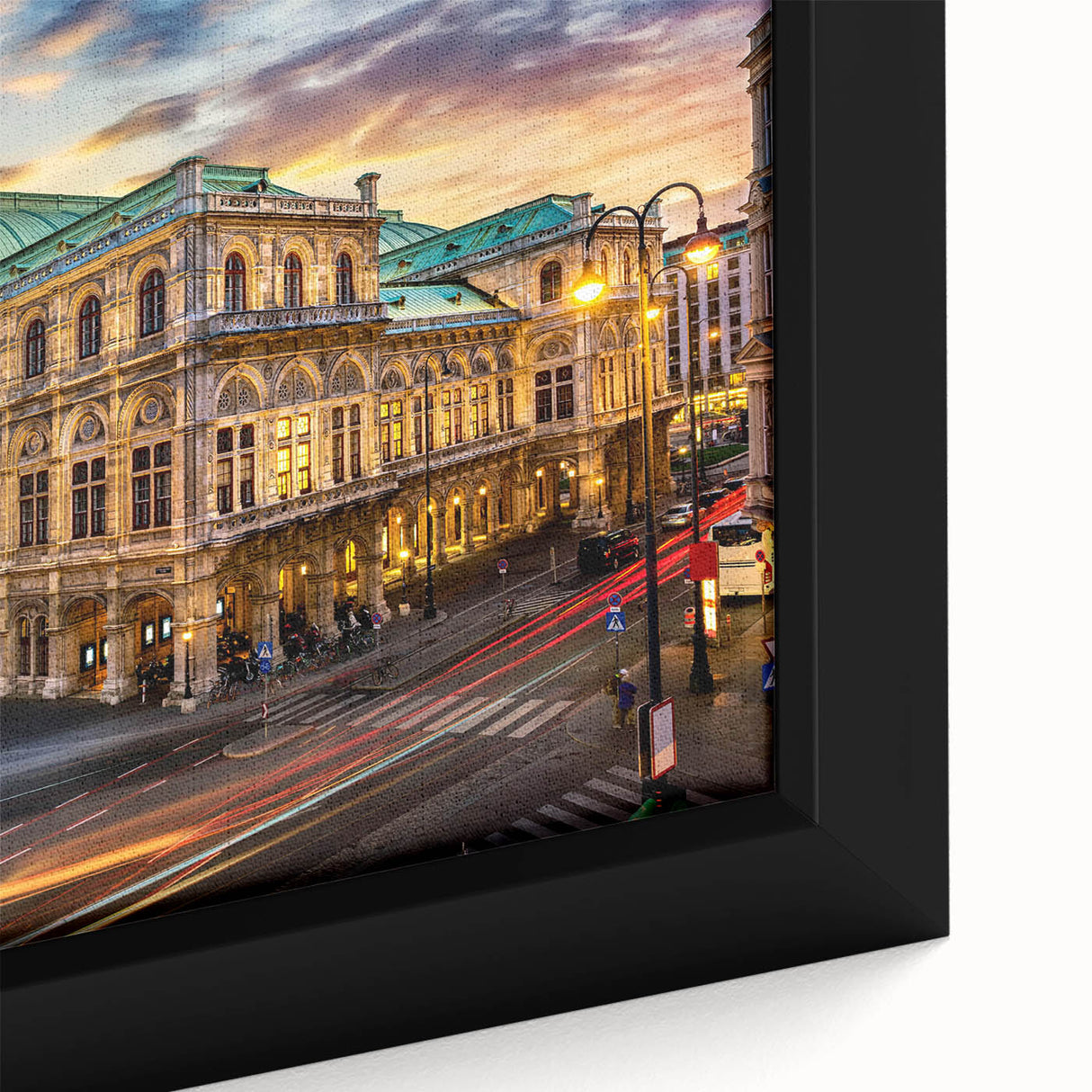 Close-up of a framed canvas artwork showcasing a vibrant urban landscape design, featuring intricate street details and bold colors, ideal for modern home decor.