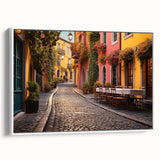 Framed canvas wall art depicting a vibrant city street landscape, showcasing detailed buildings and lively colors, displayed against a white background, ideal for modern home decor.