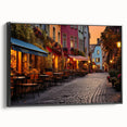 Framed canvas wall art showcasing a modern street landscape design in vibrant colors, featuring a black frame and side view to highlight its sleek profile, perfect for contemporary decor.
