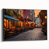 Framed canvas wall art showcasing a modern street landscape design in vibrant colors, featuring a black frame and side view to highlight its sleek profile, perfect for contemporary decor.