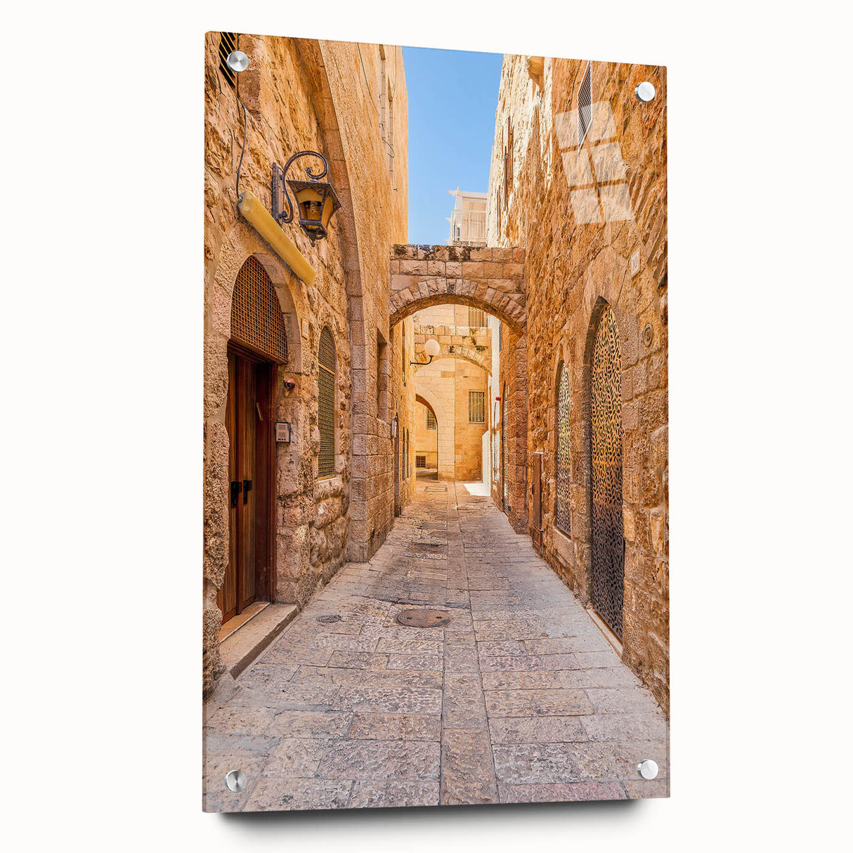 Acrylic glass wall art featuring a vibrant street landscape design, showcasing vivid colors and intricate details, displayed in a side view with decorative pins.
