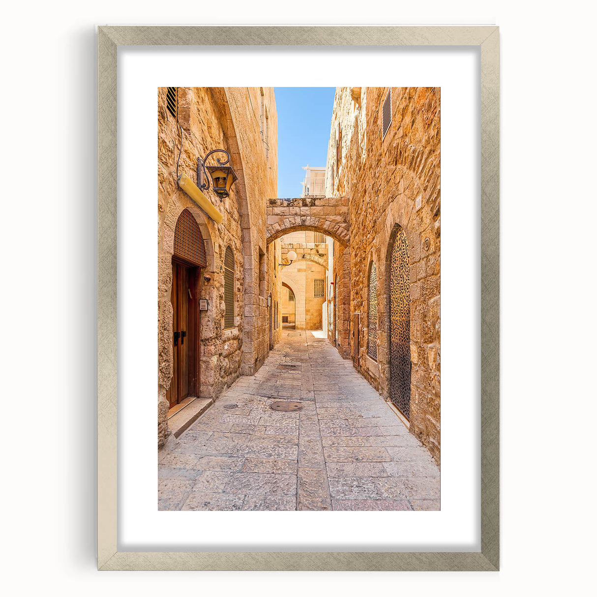 Framed wall art showcasing a vibrant street landscape design, featuring a silver mat for an elegant finish, ideal for modern home decor.
