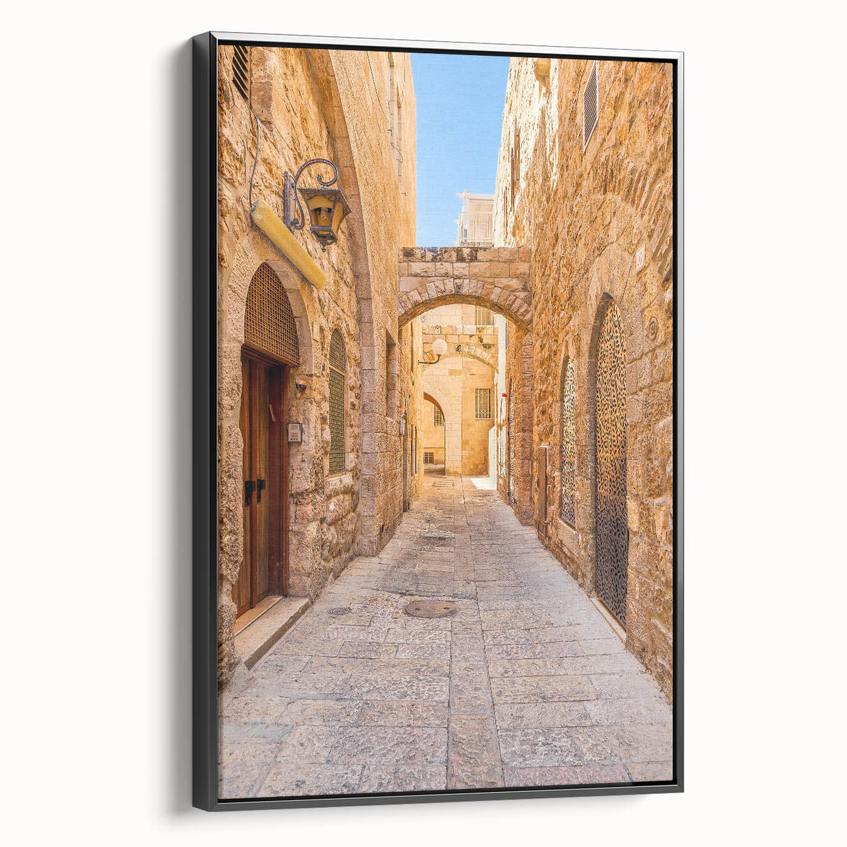 Framed canvas wall art showcasing a modern street landscape design in vibrant colors, with a sleek black frame, perfect for contemporary home decor.