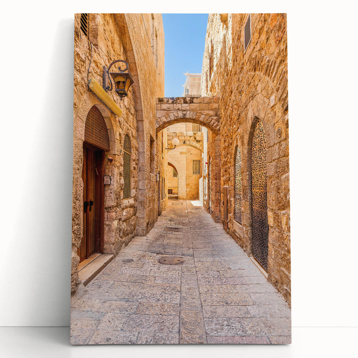Stretched canvas wall art showcasing a vibrant street landscape design with colorful buildings and bustling urban life, perfect for modern home decor.