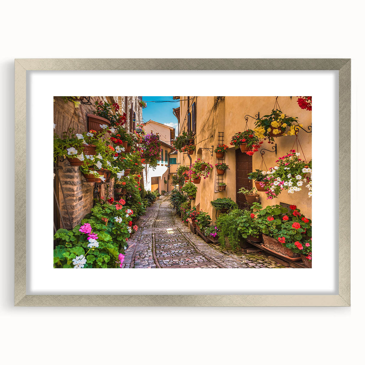 Framed wall art featuring a modern landscape design in a silver frame with a mat, showcasing vibrant colors and intricate details, ideal for home decor.