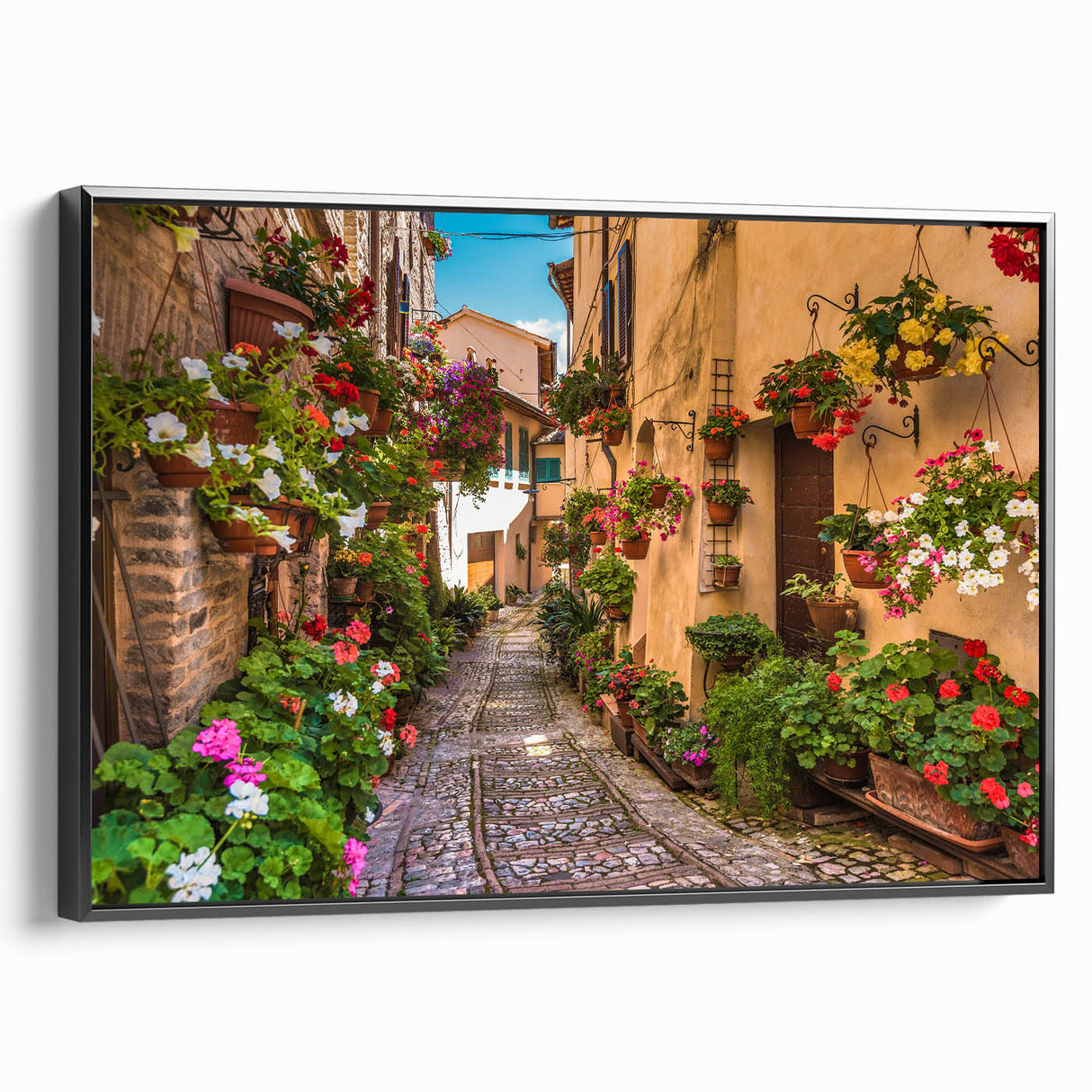 Framed canvas wall art showcasing a modern street landscape design, featuring vibrant colors and intricate details, presented in a sleek black frame. Perfect for contemporary decor.