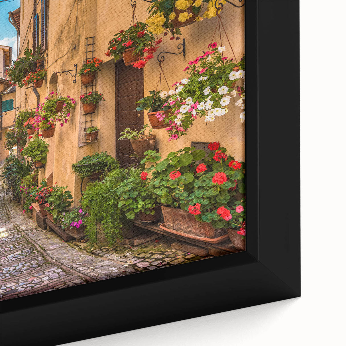 Close-up of a framed canvas wall art piece showcasing an intricate cityscape design with vibrant colors and detailed street elements, ideal for modern home decor.
