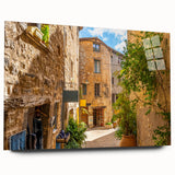 Acrylic glass wall art design showcasing a vibrant street landscape, featuring vivid colors and intricate details, displayed without pins in a contemporary setting.