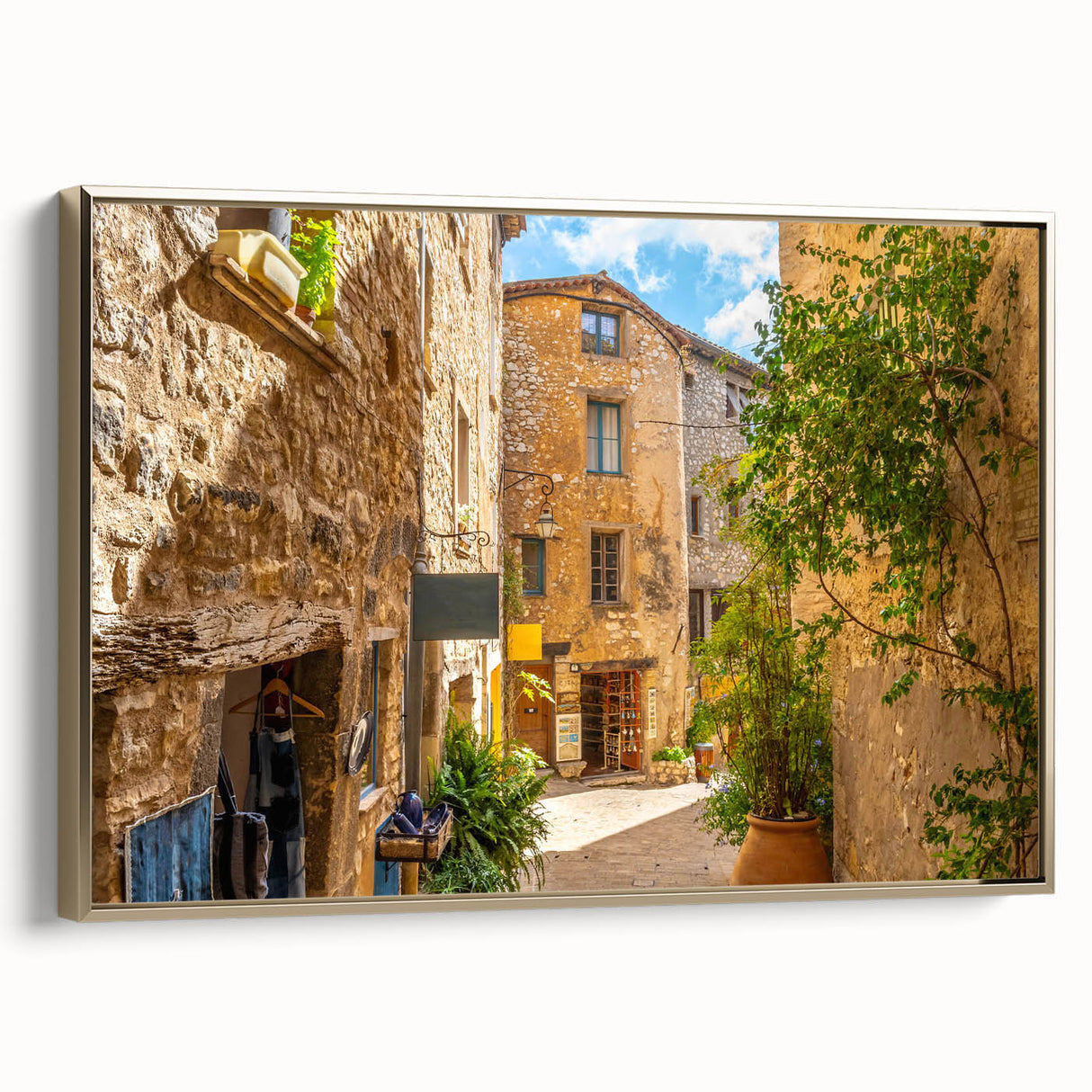 Framed canvas wall art showcasing a vibrant cityscape design with gold accents, perfect for modern home decor. Side view highlights the sleek frame and artistic detail.
