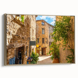 Framed canvas wall art showcasing a vibrant cityscape design with gold accents, perfect for modern home decor. Side view highlights the sleek frame and artistic detail.