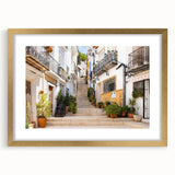 Elegant framed wall art featuring a serene landscape design with vibrant colors, set in a gold frame with a mat, perfect for enhancing home decor.