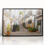Framed acrylic wall art showcasing a vibrant street landscape design with intricate details, featuring a sleek black frame that enhances its modern aesthetic. Ideal for home or office decor, this piece adds a touch of urban sophistication to any space.