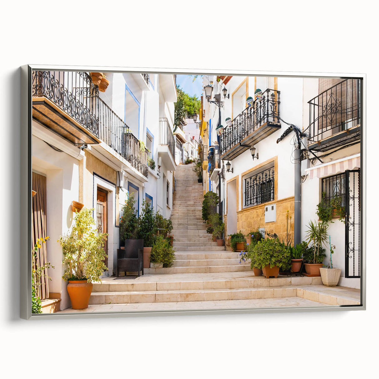 Framed canvas wall art showcasing a modern cityscape in silver tones, ideal for contemporary home decor. Perfect for enhancing living spaces with urban elegance.