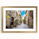 Framed wall art collection showcasing four vibrant landscape and street design prints with a gold mat, perfect for modern home decor. Ideal for art enthusiasts.