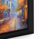 Framed canvas wall art showcasing a vibrant street landscape design in warm colors, perfect for modern home decor. The close-up highlights intricate details and textures.