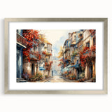 Framed wall art featuring a vibrant street landscape design, with a silver mat and frame, showcasing intricate details and vivid colors, perfect for modern decor.