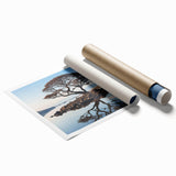 Vibrant landscape wall art print showcasing lush green trees against a serene blue sky, rolled for easy transport and ideal for home decor enhancement.