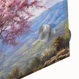 Close-up of a vibrant acrylic glass wall art piece showcasing a serene landscape with lush green trees and a bright blue sky, perfect for home décor.