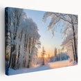 Stretched canvas wall art showcasing a serene landscape with lush green trees and a vibrant sunset, perfect for enhancing home decor with nature-inspired elegance.