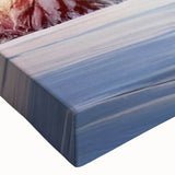 Close-up of a stretched canvas showcasing a vibrant landscape design with trees, featuring rich greens and earthy tones, perfect for home decor enhancement.