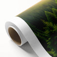 Rolled canvas wall art featuring a vibrant landscape design with lush green trees and a serene blue sky, elegantly packaged in a protective cardboard tube.