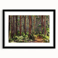 Framed wall art collection showcasing a vibrant landscape with trees, featuring a sleek black frame and mat, perfect for enhancing home decor.