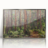 Framed acrylic wall art featuring a serene landscape of trees with silver accents, designed to enhance home decor with a modern touch. The artwork portrays vibrant greens and subtle earth tones, creating a calming atmosphere suitable for living rooms or offices.