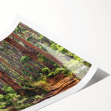 Rolled print of a serene landscape featuring vibrant green trees against a clear blue sky, designed for wall art decor, ideal for nature enthusiasts.