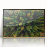 Framed wall art featuring a modern landscape design with trees in vibrant colors, set against a gold-accented background, ideal for home decor.