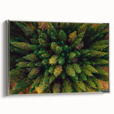 Framed canvas wall art showcasing a serene landscape with stylized trees, featuring a silver frame. Ideal for adding a modern touch to home decor.