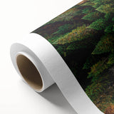 Rolled canvas wall art showcasing a serene landscape with lush green trees and a vibrant blue sky, designed to enhance home decor and create a calming atmosphere.