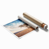 Rolled print of a serene landscape featuring tall green trees against a soft blue sky, perfect for home decor or interior design, showcasing nature's tranquility.